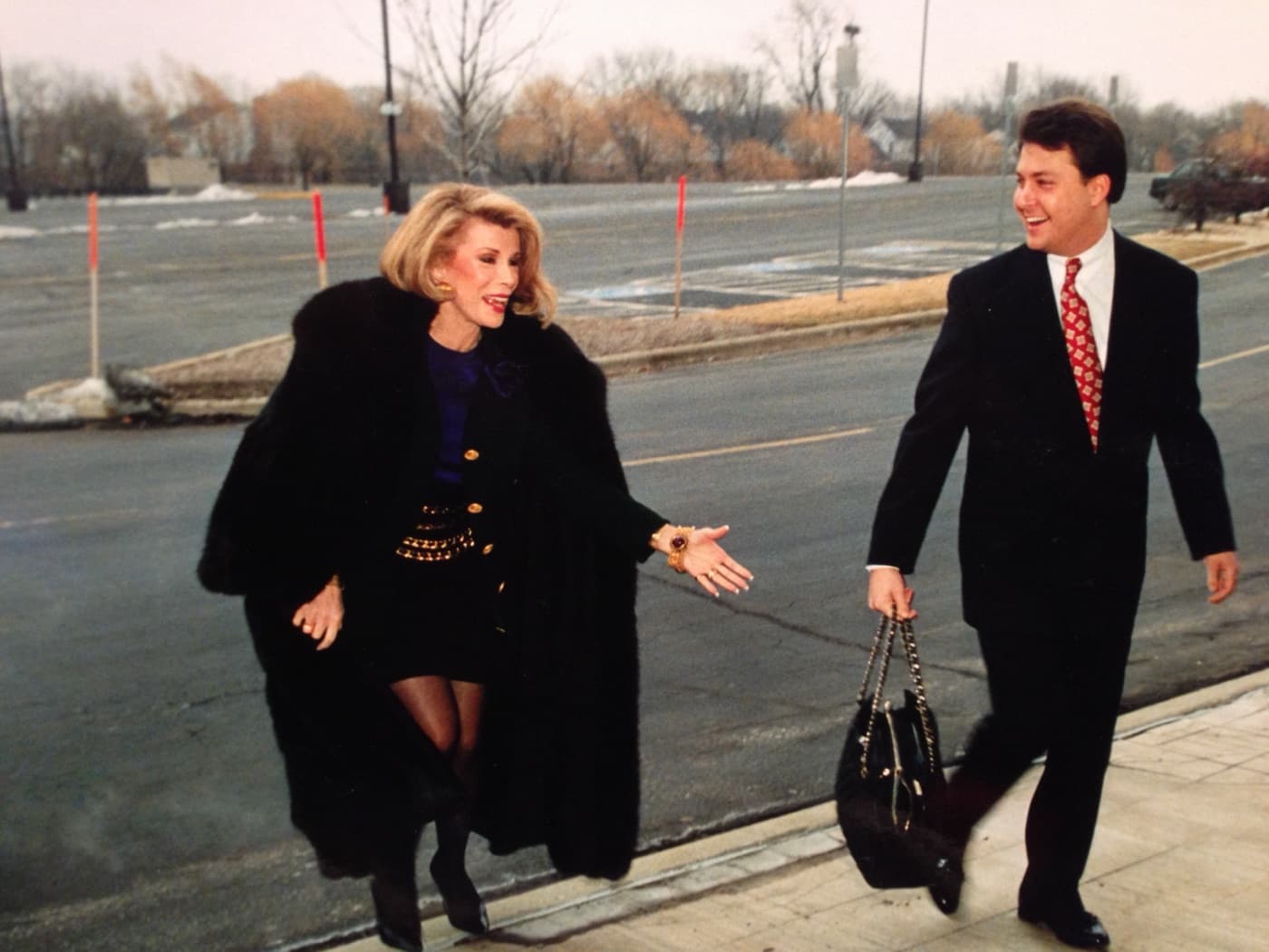 Barry Poznick walking with Joan Rivers