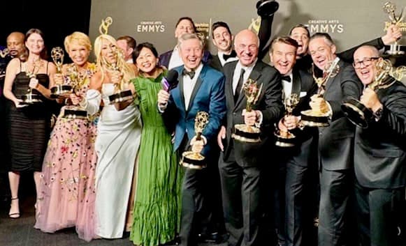 Barry Poznick celebrating with the Shark Tank team at the Creative Arts Emmys